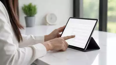 User submitting online form on tablet